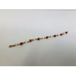 A VINTAGE PEARL AND CORAL BEADED BRACELET MARKED 9K