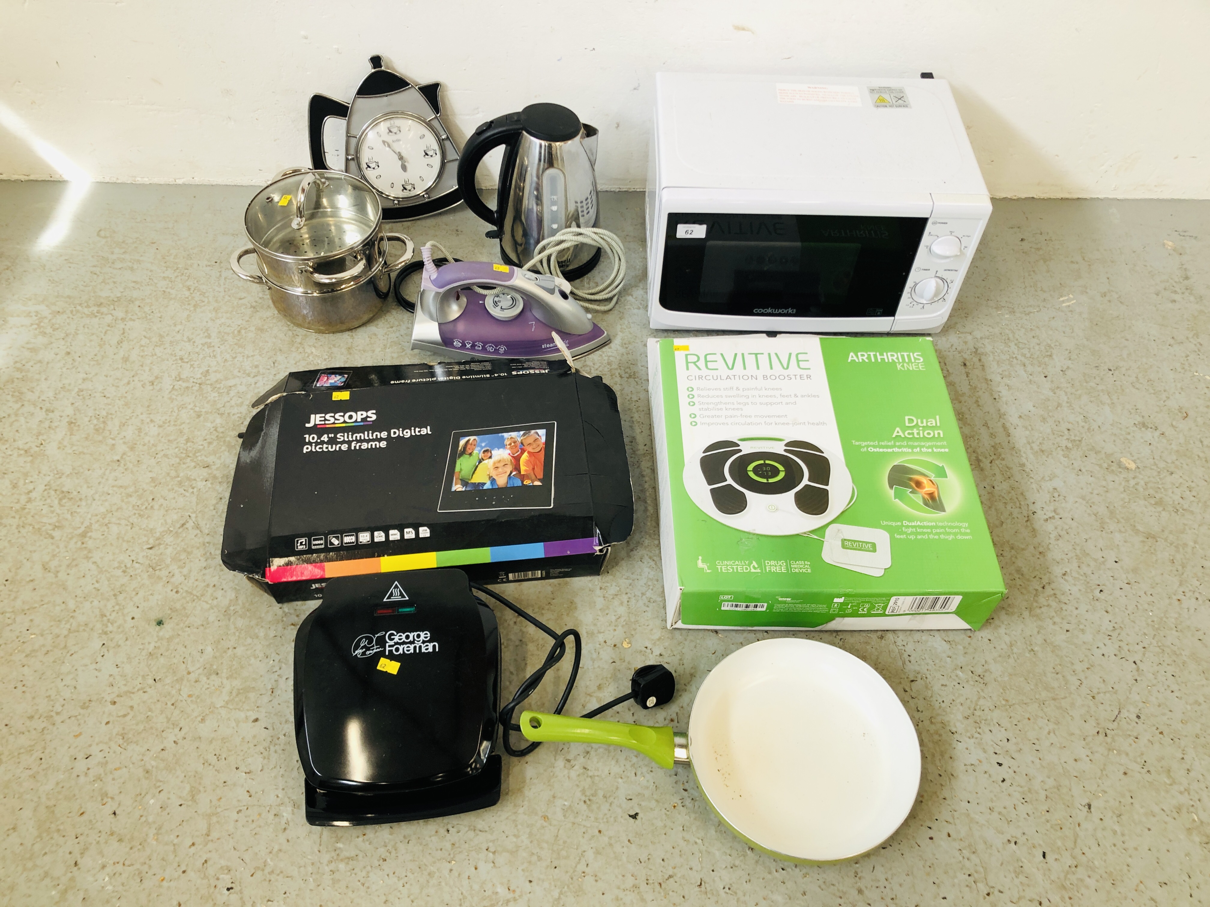 A COOKWORKS MICROWAVE OVEN, A GEORGE FORMAN GRILL, A MORPHY RICHARDS STEAM IRON,