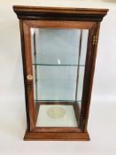 A GLASS DISPLAY CASE IN WOOD FRAME MADE BY FREEMANS NORWICH H 70CM, W 40CM,