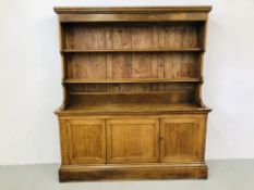 AN OAK THREE DOOR CUPBOARD WITH DRESSER TOP W 179CM. D 37CM.