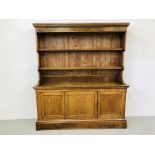 AN OAK THREE DOOR CUPBOARD WITH DRESSER TOP W 179CM. D 37CM.