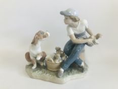 A LLADRO FIGURE BOY WITH DOG AND PUPPIES