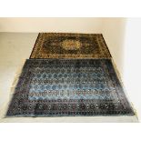 NATANZ PURE WOOL RUG 174CM. X 119CM. ALONG WITH AN AZTEC DESIGN RUG ON A BLUE BACKGROUND 174CM.