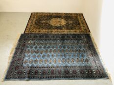 NATANZ PURE WOOL RUG 174CM. X 119CM. ALONG WITH AN AZTEC DESIGN RUG ON A BLUE BACKGROUND 174CM.