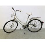 A LADIES RALEIGH "CAPRICE" THREE SPEED BICYCLE