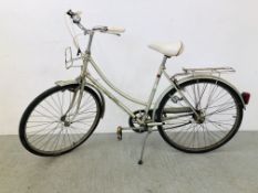A LADIES RALEIGH "CAPRICE" THREE SPEED BICYCLE