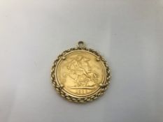 A FULL GOLD SOVEREIGN IN PENDANT MOUNT