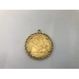 A FULL GOLD SOVEREIGN IN PENDANT MOUNT