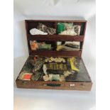 A FITTED CARRY CASE WITH AN ASSORTMENT OF CRAFT RELATED ACCESSORIES TO INCLUDE COTTONS, THREADS,