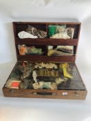 A FITTED CARRY CASE WITH AN ASSORTMENT OF CRAFT RELATED ACCESSORIES TO INCLUDE COTTONS, THREADS,