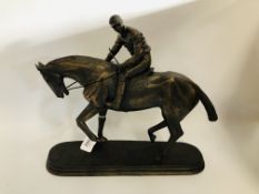 A BRONZE EFFECT STUDY OF JOCKEY & RACEHORSE, THE PLINTH MARKED O.