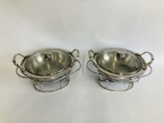 A PAIR OF STAINLESS STEEL CHAFING DISHES