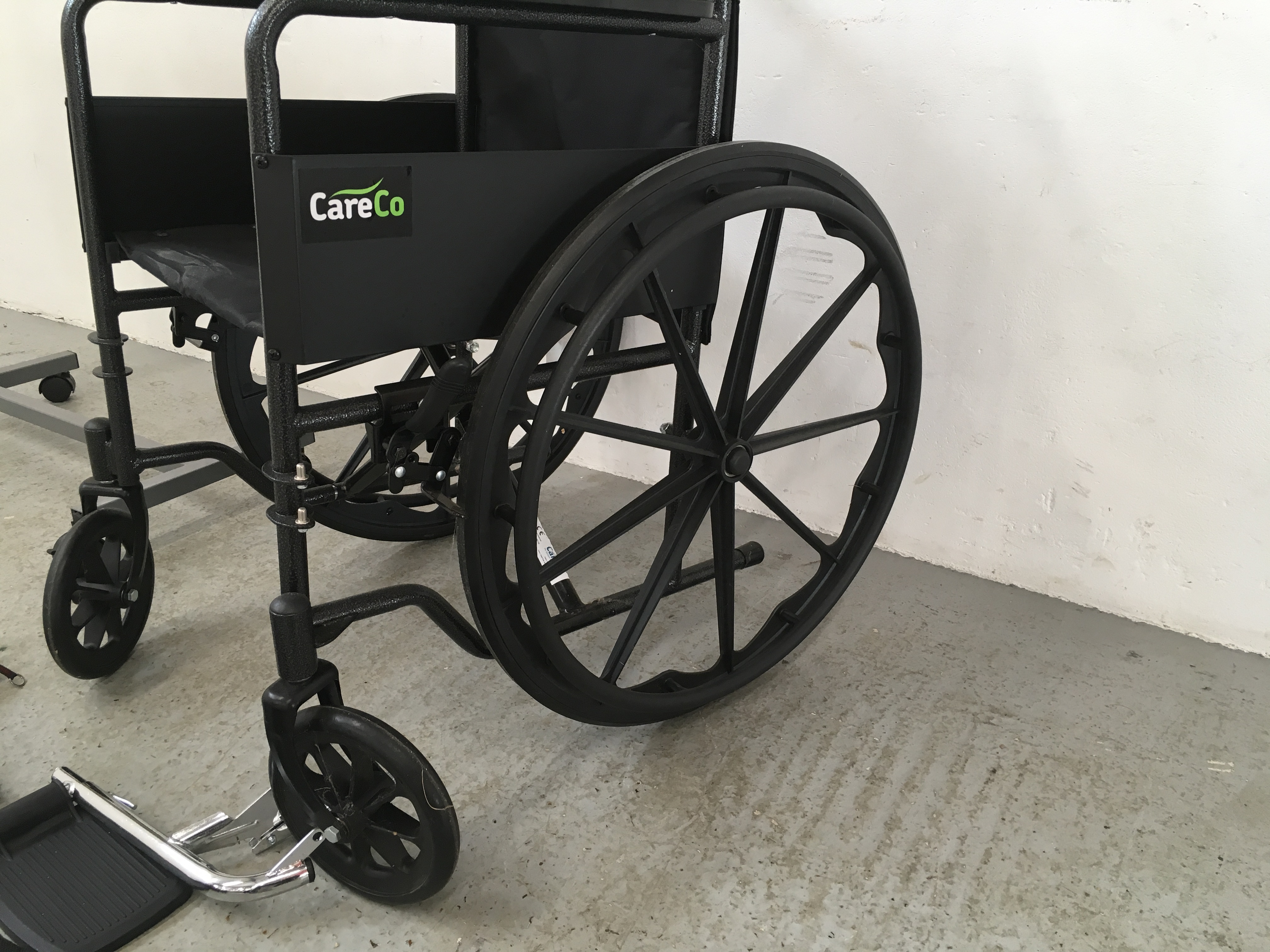 CARE CO WHEEL CHAIR AND FOOT RESTS ALONG WITH A WHEELED BED TRAY - Image 4 of 9