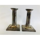 PAIR OF SILVER CANDLE STICKS LONDON ASSAY H 12CM.