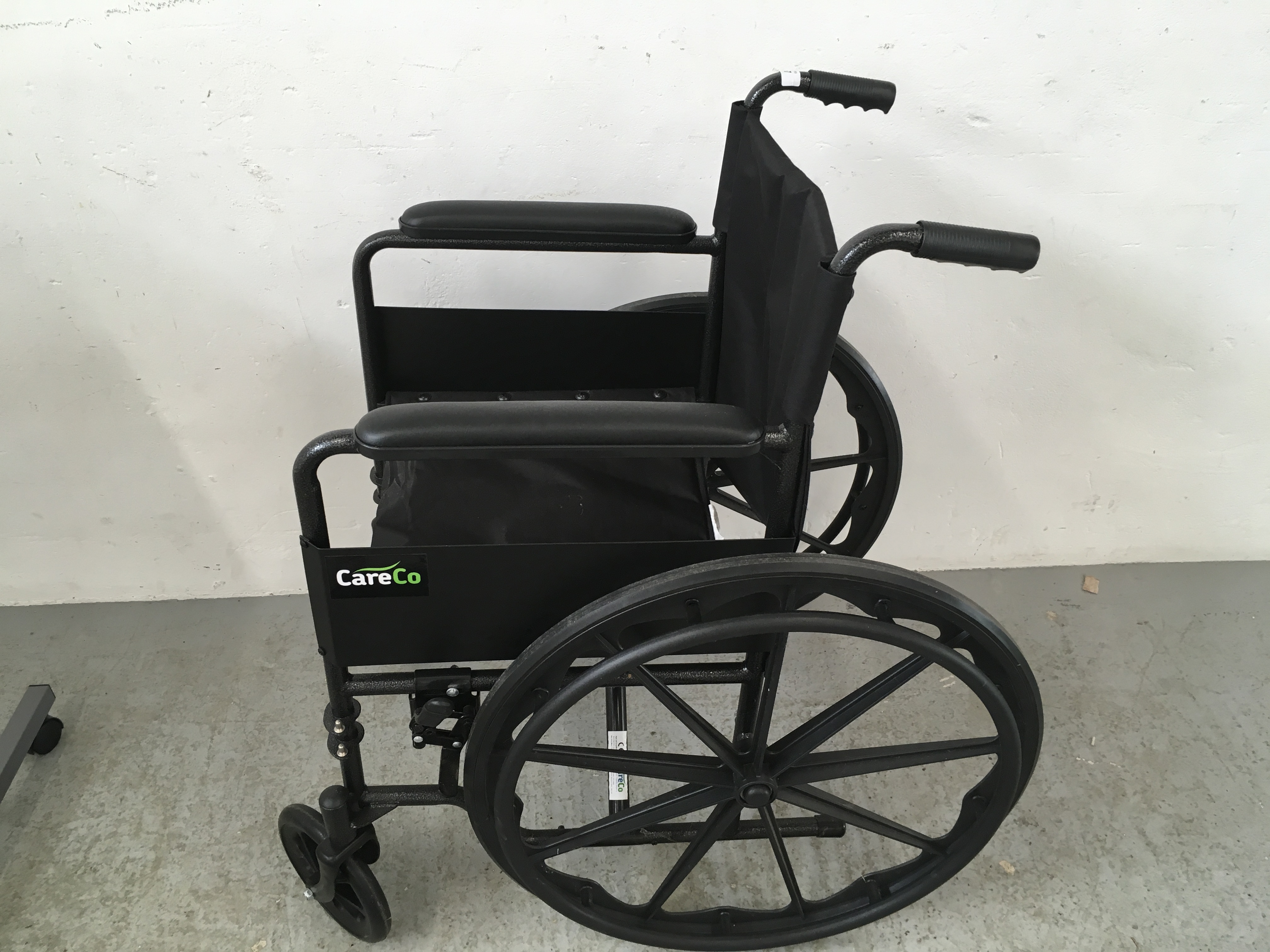 CARE CO WHEEL CHAIR AND FOOT RESTS ALONG WITH A WHEELED BED TRAY - Image 5 of 9