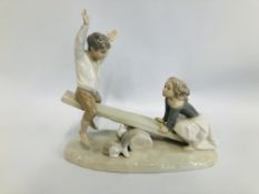 LLADRO FIGURED GROUP "CHILDREN PLAYING ON A SEE-SAW" H 21CM