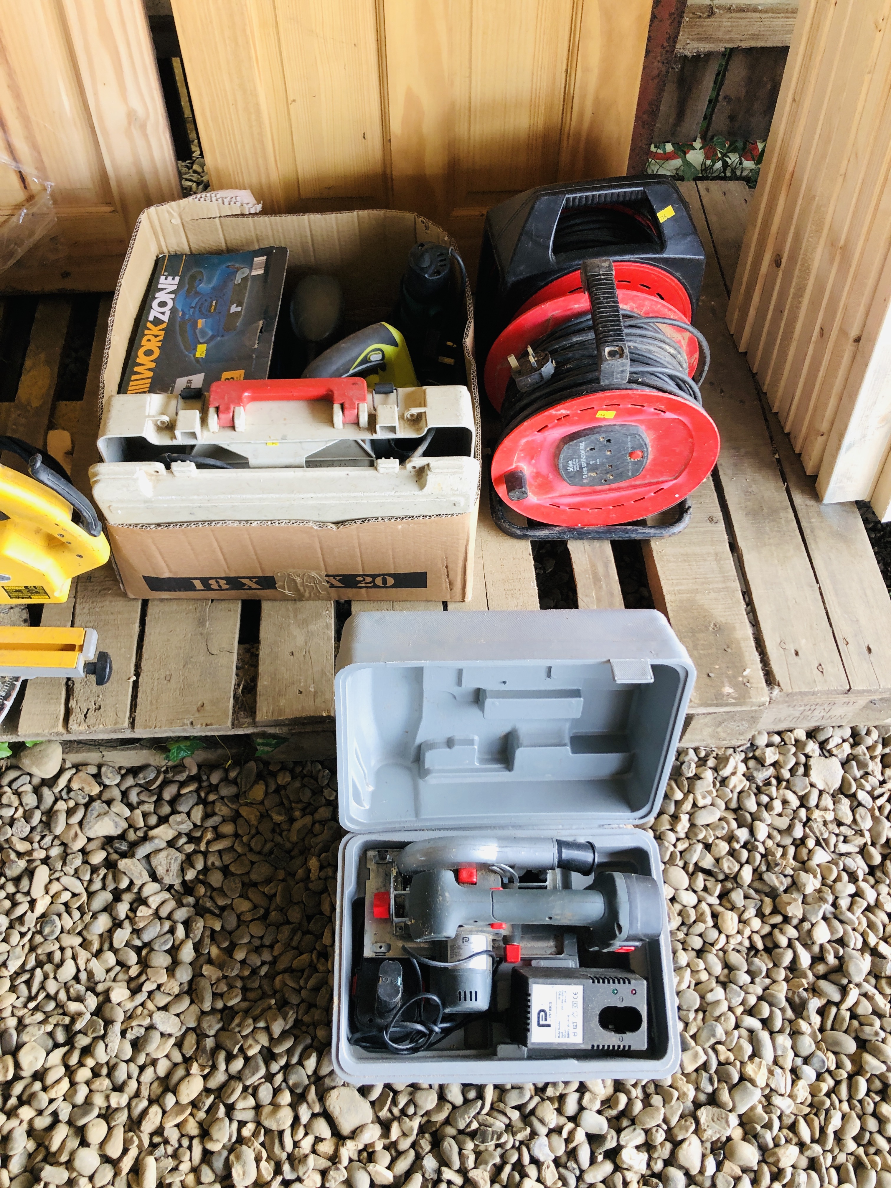 A WORKZONE 900 WATT BELT SANDER, A RYOBI 600 WATT ELECTRIC PLANER, A BOSCH 110 VOLT POWER DRILL,