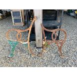 A PAIR OF VINTAGE CAST IRON BENCH ENDS A/F