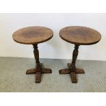 A PAIR OF GOOD QUALITY SOLID OAK PEDESTAL OCCASIONAL TABLES WITH CIRCULAR TOPS (DIA. 45CM.