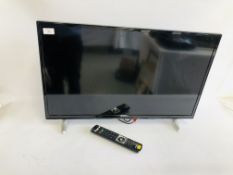 A HITACHI 32 INCH TELEVISION COMPLETE WITH REMOTE - SOLD AS SEEN