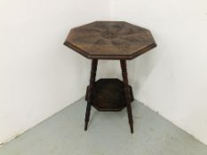 A MAHOGANY TWO TIER OCC TABLE WITH HAND CARVED DETAIL TO BOTH THE OCTAGONAL TOP AND LOWER TIER