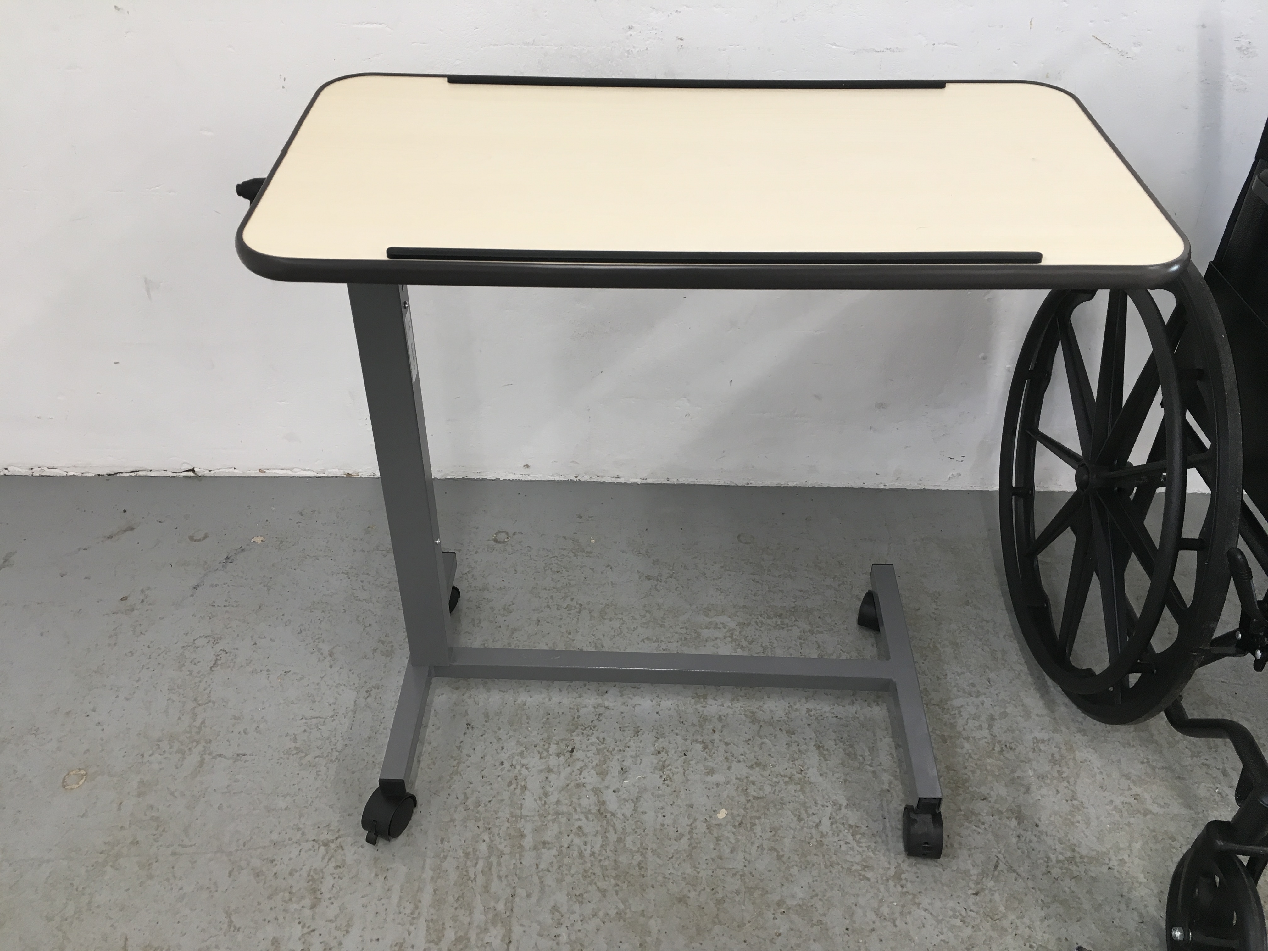 CARE CO WHEEL CHAIR AND FOOT RESTS ALONG WITH A WHEELED BED TRAY - Image 2 of 9