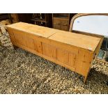 A SOLID HONEY PINE HINGED TOP BENCH / BLANKET BOX - W 165CM. D 35CM. H 56CM.