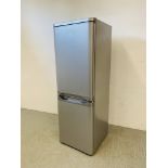 AN INDISIT SILVER FINISH FRIDGE FREEZER - SOLD AS SEEN