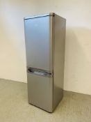 AN INDISIT SILVER FINISH FRIDGE FREEZER - SOLD AS SEEN