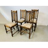 A SET OF FOUR 1940'S OAK DINING CHAIRS WITH SLAT BACK AND BULLSEYE DETAIL