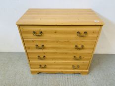 A MODERN PINE EFFECT FOUR DRAWER CHEST. W 76CM. D 41CM. H 76CM.