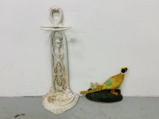 A DECORATIVE CAST IRON UMBRELLA / STICK STAND A/F AND A DECORATIVE CAST IRON COCK PHEASANT DOOR