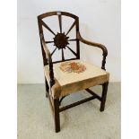 A PERIOD MAHOGANY ELBOW CHAIR WITH UNUSUAL FLOWERHEAD DESIGN TO BACK AND EMBROIDED SEAT