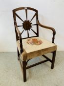 A PERIOD MAHOGANY ELBOW CHAIR WITH UNUSUAL FLOWERHEAD DESIGN TO BACK AND EMBROIDED SEAT