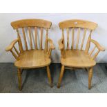 A PAIR OF TRADITIONAL BEECH WOOD ELBOW CHAIRS