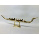 A BRASS SUPHANNAHONG ROYAL BARGE. 78CM LONG. 32CM HIGH TOP OF NOSE. 21CM HIGH MIDDLE.
