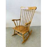 A MODERN BEECHWOOD STICK BACK ROCKING CHAIR