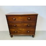 AN ANTIQUE VICTORIAN MAHOGANY 3 DRAWER CHEST WITH TURNED WOODEN KNOBS, W 110CM, D 53CM, H 107CM.
