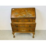 AN ANTIQUE 3 DRAWER FITTED WRITING BUREAU WITH APPLIED ORIENTAL DECORATION STANDING ON BALL AND