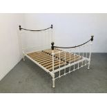 A MODERN VICTORIAN STYLE METAL FRAMED DOUBLE BED FRAME WITH BRASS FINIAL FINISH