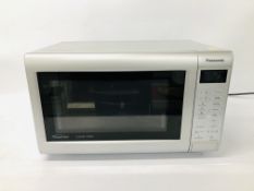 A PANASONIC INVERTER SLIMLINE COMBI MICROWAVE OVEN - SOLD AS SEEN