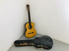 A ASTURIAS ACOUSTIC GUITAR IN WEATHERED CASE