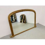 A WAXED PINE OVER MANTEL MIRROR. W 125CM. H 82CM.