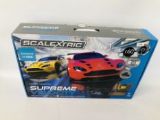 A BOXED SCALEXTRIC ASTON MARTIN SUPREME VELOCITY RACING GAME