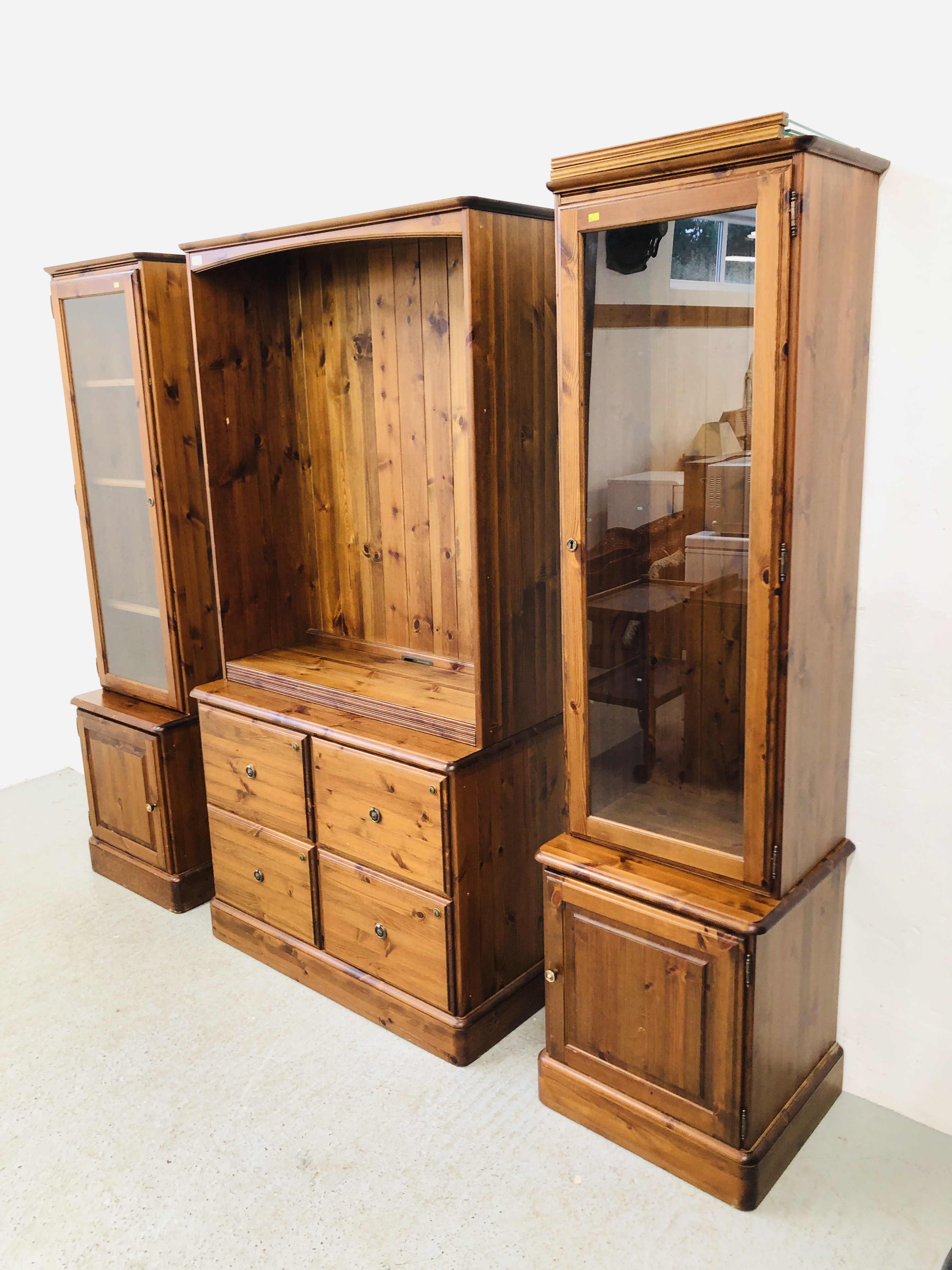 A PAIR OF DUCAL HONEY PINE GLAZED CABINETS WITH CABINET BASES EACH W 51CM. D 44CM. H 89CM. - Image 2 of 12