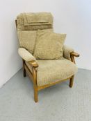A GOOD QUALITY MODERN BEIGE UPHOLSTERED HIGH SEATED EASY CHAIR