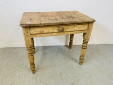 AN ANTIQUE WAXED COUNTRY PINE SINGLE DRAWER SIDE TABLE ON TURNED LEG. W 87CM. D 56CM. H 74CM.