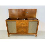 A DYNATRON RADIOGRAM IN BURR WALNUT FINISH CABINET,