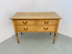 A LIGHT OAK THREE DRAWER CHEST THE TWO SHORT DRAWERS OVER ONE LONG W 107CM, D 50CM,