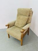 A GOOD QUALITY MODERN BEIGE UPHOLSTERED HIGH SEATED EASY CHAIR